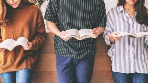 Guy reading Romance Novel