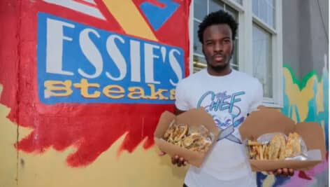 Ismail Muhammad in front of Essie's Steaks