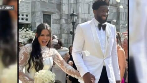 Joel Embiid and Anne de Paula