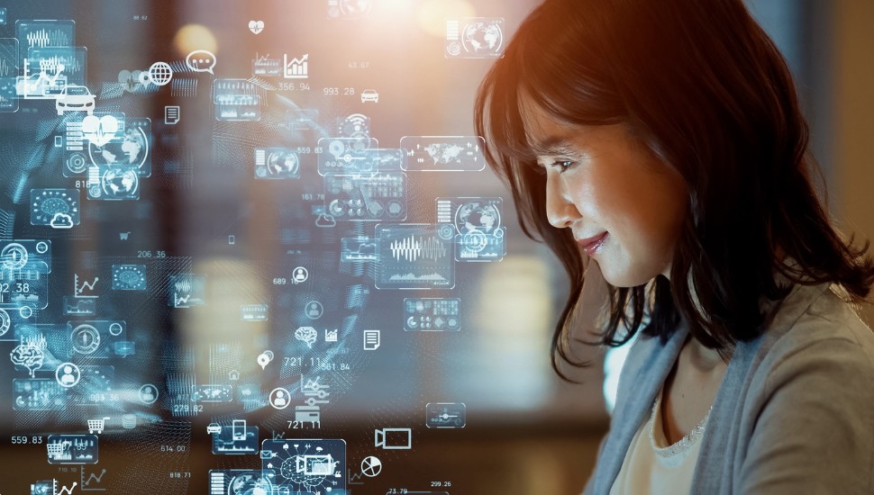 woman smiling at work with artificial intelligence icons