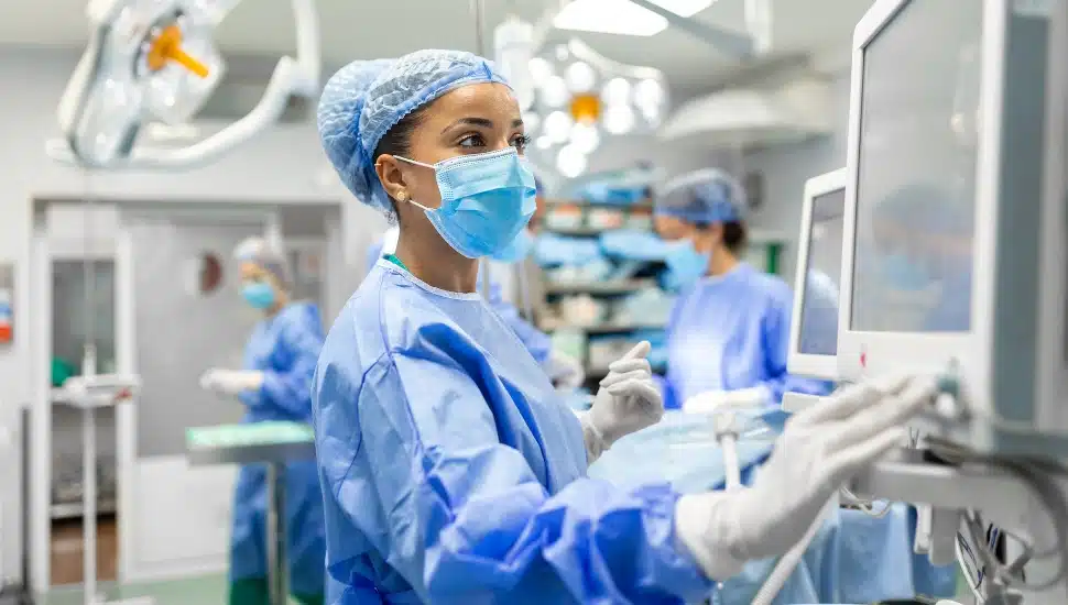 Black Nurse in an operating room.