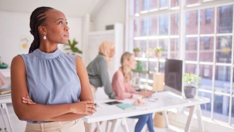 person standing in front of table confident