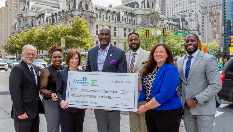 Penn Community Bank presenting the Urban League of Philadelphia with the check.