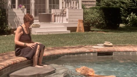 Winka Dubbeldam poolside with her dog