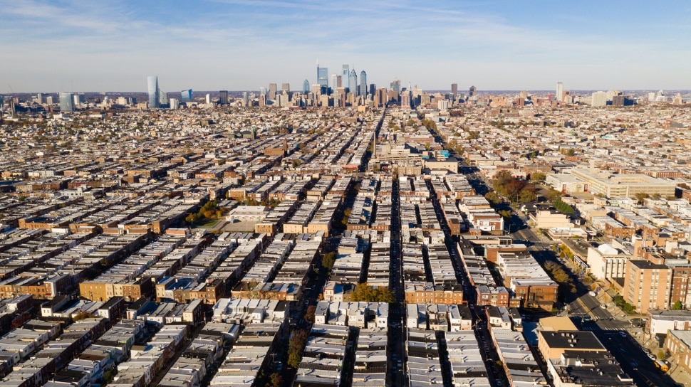 Areal view of row houses in South Philly and Philadelphia skyline.