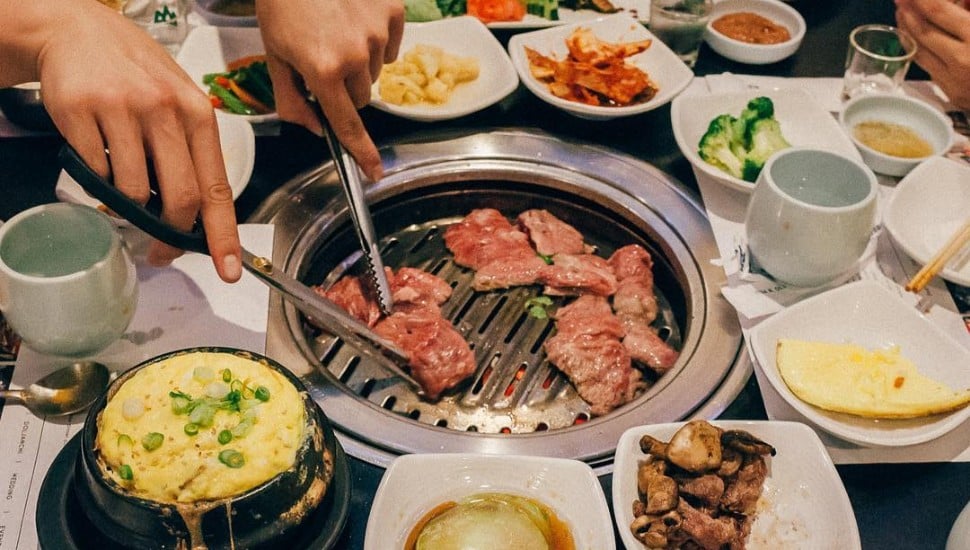 overhead view of Korean BBQ food spread at Seorabol in Northeast Philly