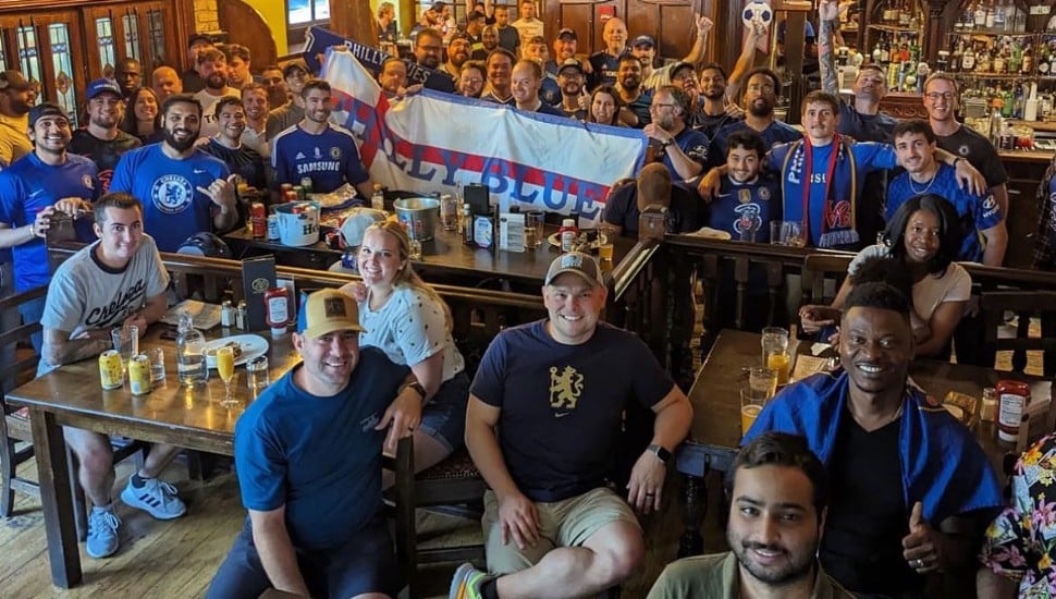 crowd of spectators in tir na nog pub in center city