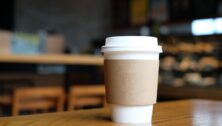 A coffee cup on a table.