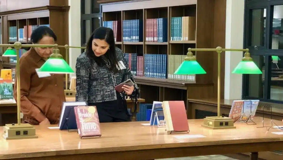 Penn State faculty check out selected books on display at the Patee Library at the University Park campus.