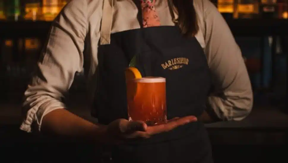 A drink held by bartender at Bar Lesieur.