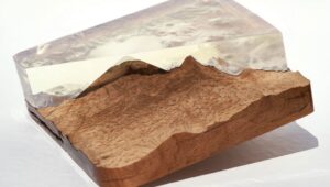 Byron Wolfe, "Vanished Volcano Visualization Kit" (detail), 2023. Resin-infused native California black oak, Eastern white oak, clear resin, digital pigment prints on linen-mounted bamboo inkjet paper for Penn State Abington instructor Julia Clift's cross-venue exhibit.