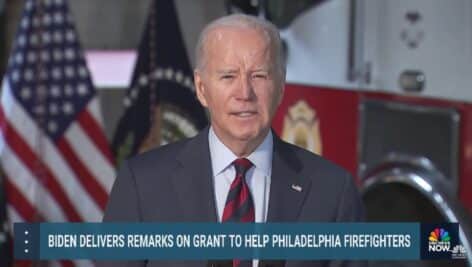 Joe Biden speaking at a podium