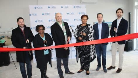 Odin Properties ribbon-cutting