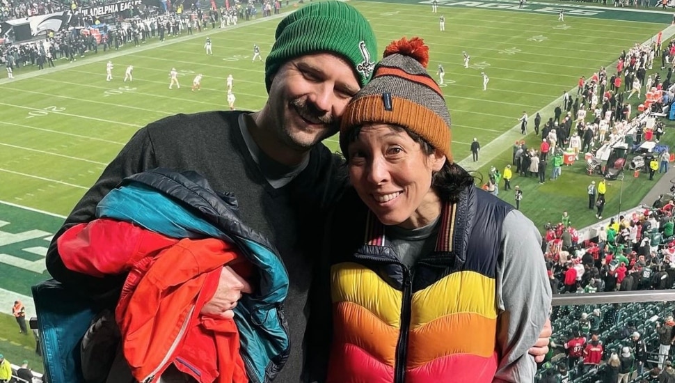 Peter Heacock and Marie Hart pose at the stands in Lincoln Financial Field.