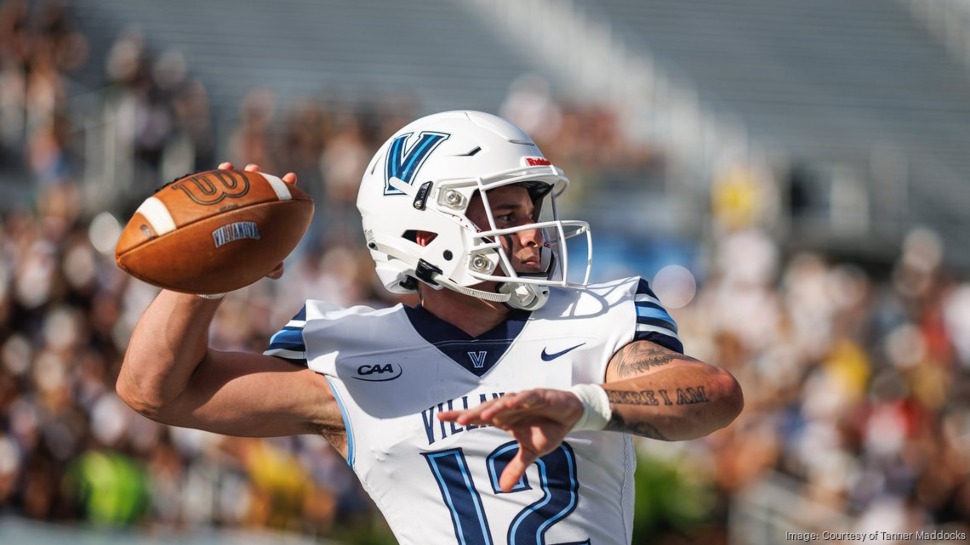 Tanner Maddocks throwing a football