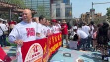 People protesting in Chinatown against proposed 76ers arena