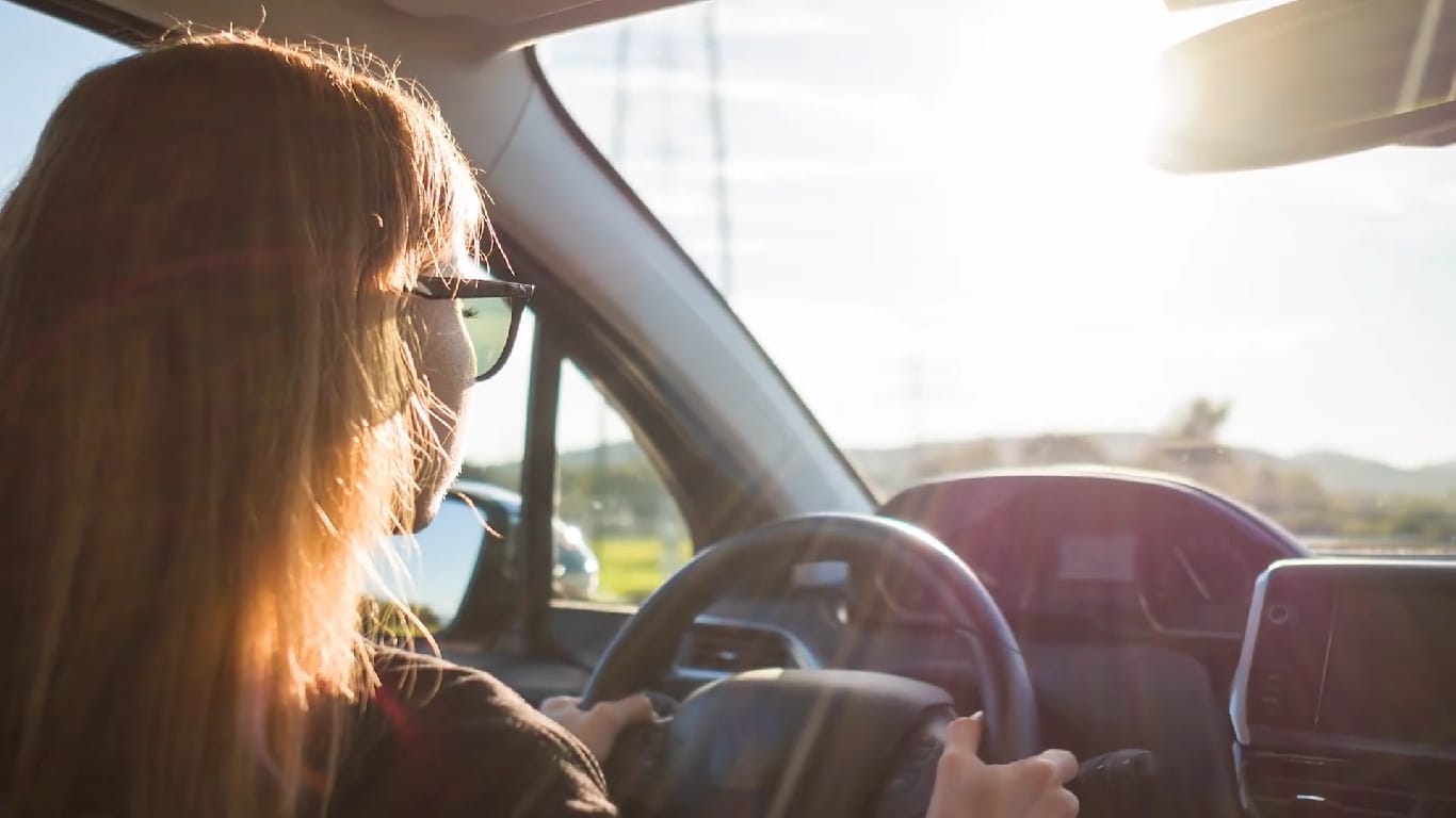 A young woman driving