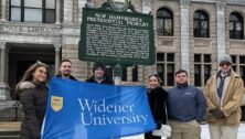 Widener University students stand in front of a New Hampshire Primary sign, proof that they got to experience the election first-hand. Widener visits New Hampshire primary