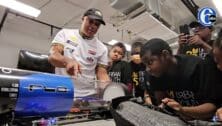 Reggie Showers teaching youth about aerodynamics.