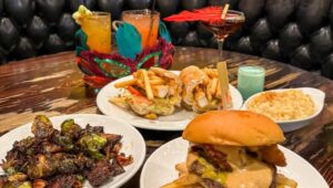 Craftman Row's food and drinks themed around Mardi Gras.