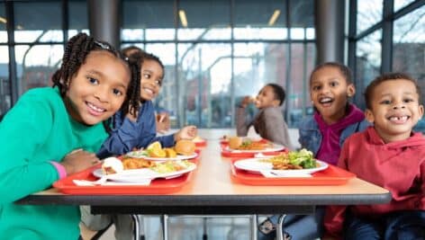 Children sitting in a school cafeteria