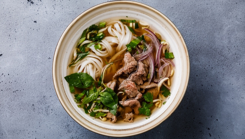 Pho Bo vietnamese Soup with beef in bowl