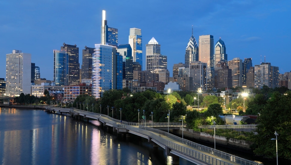 Philadelphia skyline reflected on Schuylkill River at dusk