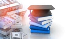 Graduation mortar board cap and books with stack of US dollars