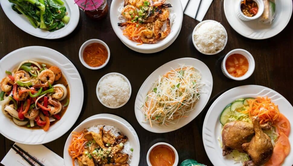 A variety of Vietnamese food on a table.