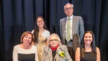 Neumann University alumni presented with Alumni Association Awards are (sitting, from left) Judith Neubauer, Edith Maletsky, and Samantha Zdun; and (standing) Casandra Nguyen and Anthony Latini.