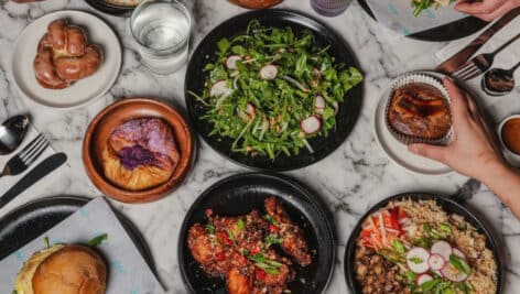 A collection of Filipino food on a table.