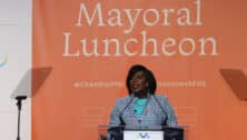 Cherelle Parker speaking at the podium during the 2024 Chamber of Commerce for Greater Philadelphia Mayoral Luncheon.