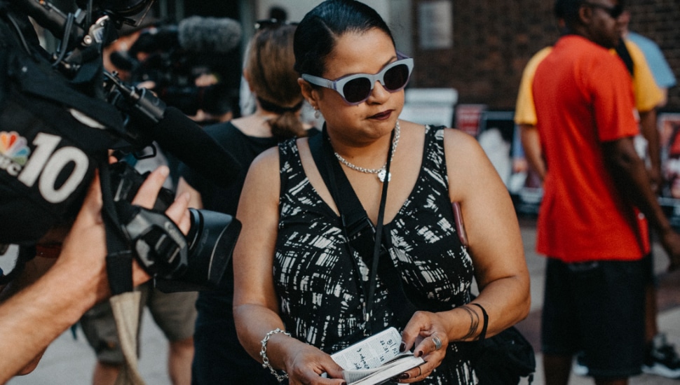 Roz Pichardo with her New Testament of lives saved