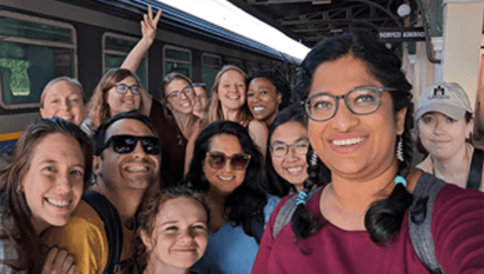 Van Allen and others gathered on a train platform while on the synod in Rome.