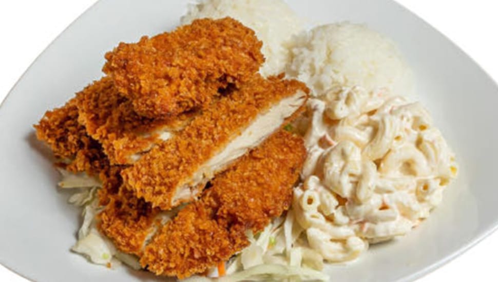 A rice bowl with pork katsu, and macaroni salad