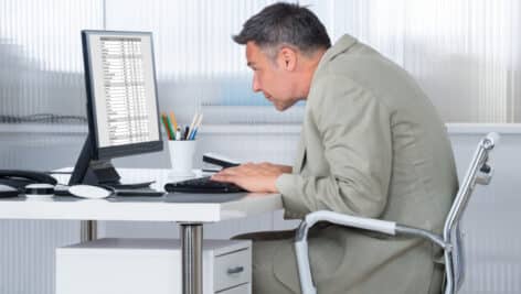 Man using computer at desk