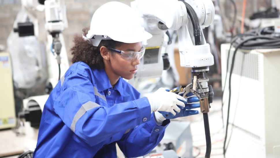 Engineer teaching robot welding machine