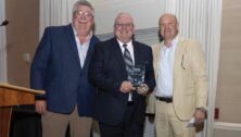 Anthony DeSenzo holding the Banker of the Year Award at the J.G. Petrucci Company, Inc. annual Leadership Awards Dinner May 9.