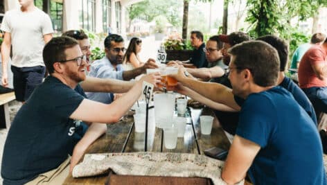 People enjoying drinks outside Independence Beer Garden.