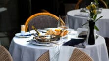 Food on the table with a white tablecloth in a restaurant.