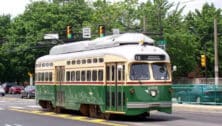 A cream and green SEPTA 15 trolley.