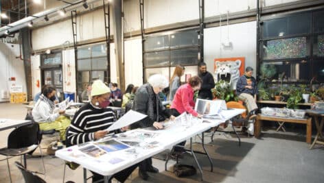 People in the NextFab maker space.