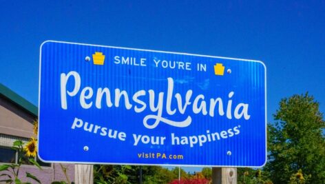 Matamoras, PA, USA October 11, 2022: A Smile Your In Pennsylvania Pursue Your Happiness sign at the Welcome Center in Matamoras.