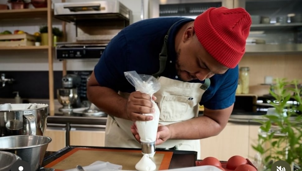 Robert Toland making a dessert.