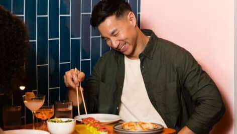 Roland Bui enjoying a meal.