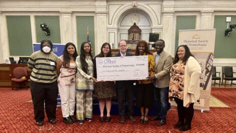 A $150,000 check being held at City Hall.