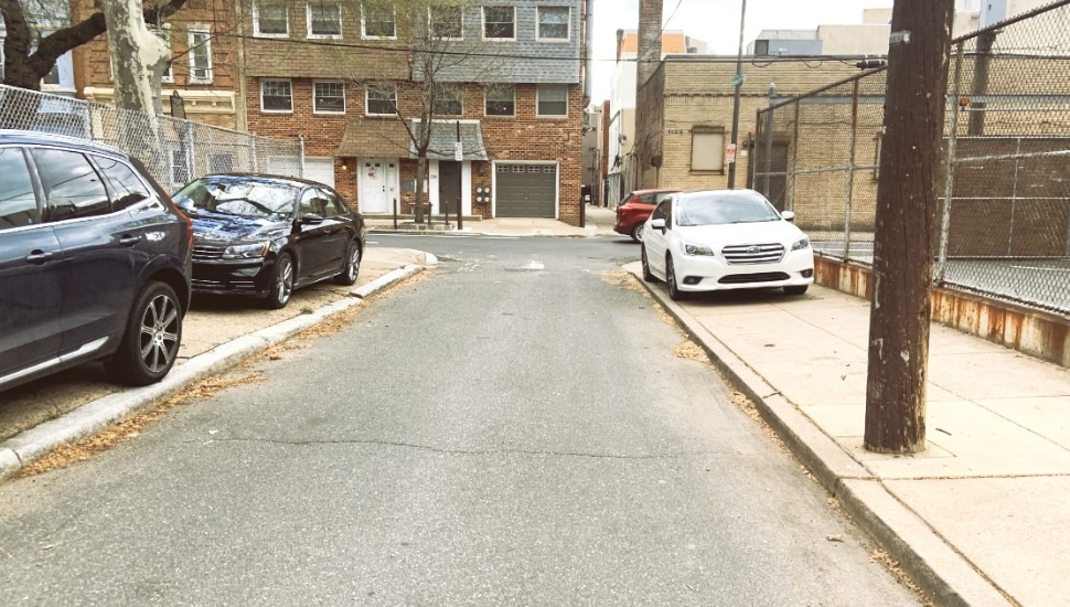 Cars parked on the sidewalks.