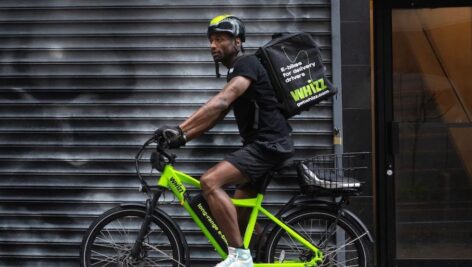 A man on an e-bike available through Whizz, a bike rental service in Philadelphia.