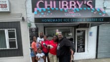 Family enjoying ice cream outside Chubby's Fantastic Flavors ice cream shop in Southwest Philadelphia.