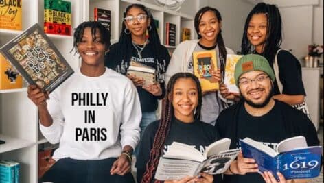 Students with books.